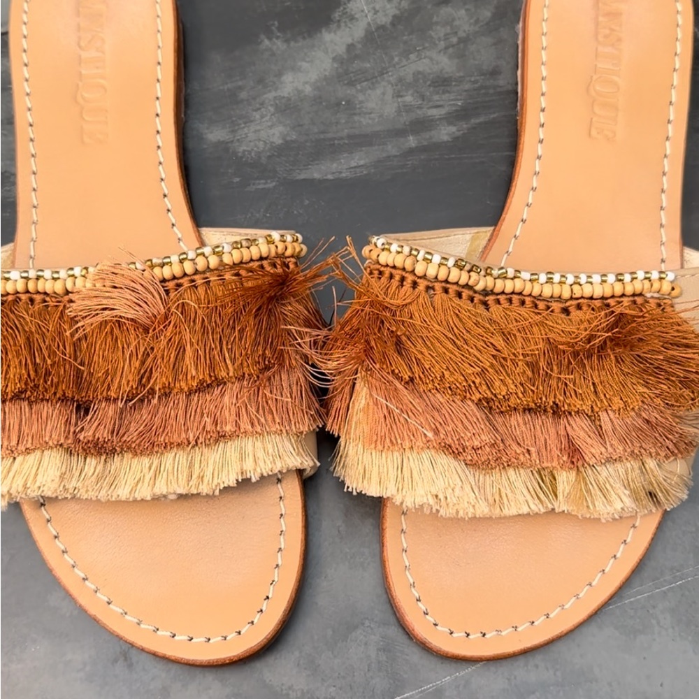 Mystique Fringe Slide Sandals in beige.